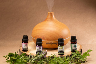 Spa-like home ritual with candle, tea and aromatherapy oil.