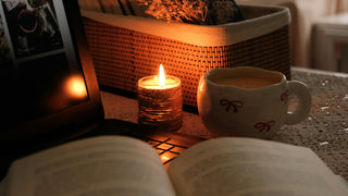 Sunday reset ritual with candle, tea, journal and aromatherapy products